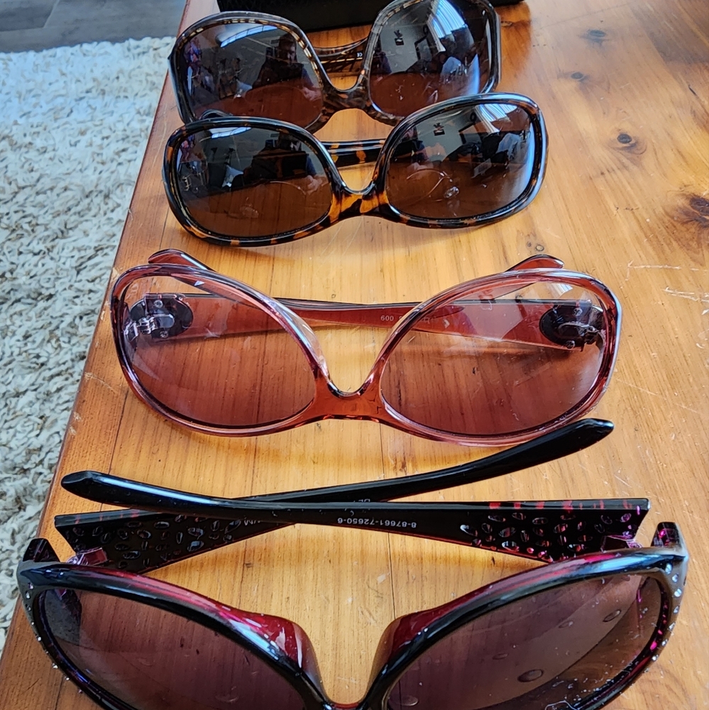 4 pair of used women's sunglasses
